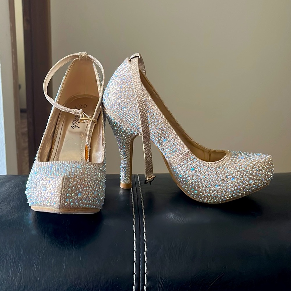 Flourish heels. Has shiny beads all around them. Perfect for a special event